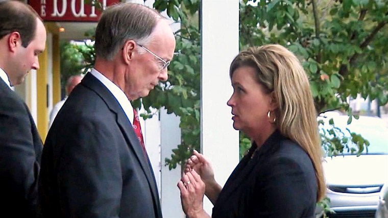 Alabama Governor Robert Bentley speaks with former aide Rebekah Mason.
