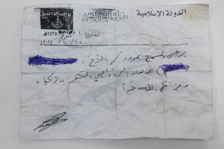 ISIS document provided to a smuggler identified as Abu Mustafa allowing him to travel freely from Raqqa, Syria to Southern Turkey.