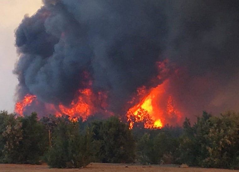 Image: A flareup of a wildfire near Needles