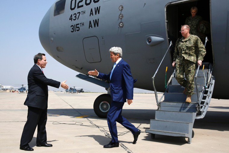 Image: Ambassador Stuart Jones greeted Kerry in Baghdad.