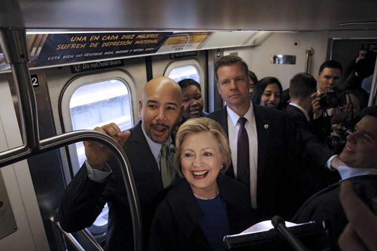 Image: U.S. Democratic presidential candidate Hillary Clinton rides the subway in New York