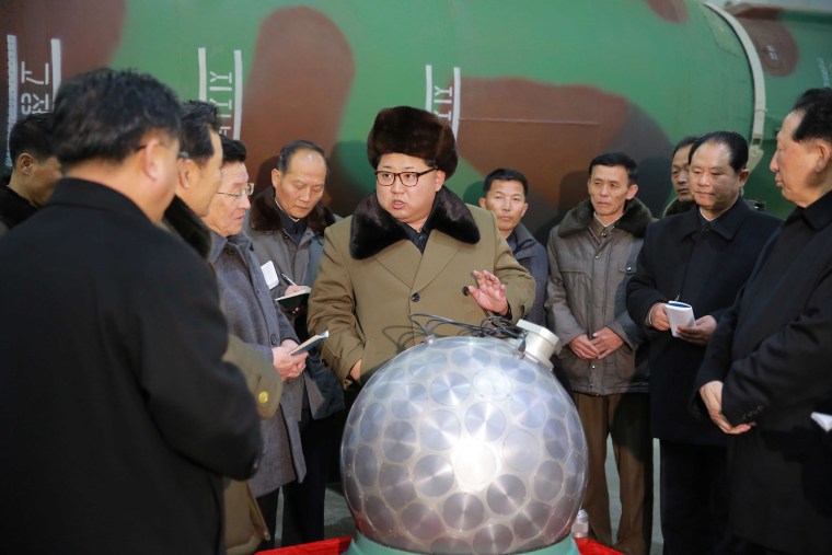 Image: North Korean leader Kim Jong Un speaks with scientists and technicians