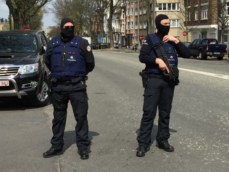 Image: There was intense police activity Saturday in the Brussels suburb of Ettenbeek.