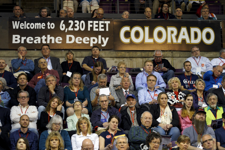 Image: Attendees at the Colorado Republican state convention listen to a speaker at the event in Colorado Springs