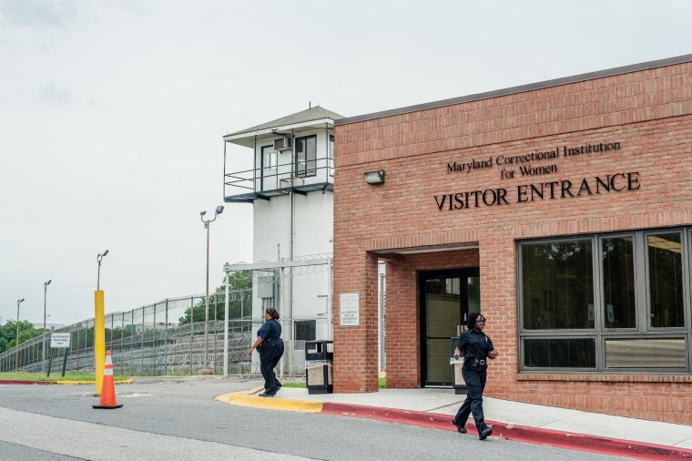 Stephen Moyer, Secretary of the Maryland Dept of Public Safety and Correctional Services, tours the Correctional Institution for Women with the warden, Margaret Chippendale.