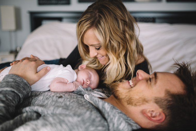 Mom sleeping in crib with baby hotsell