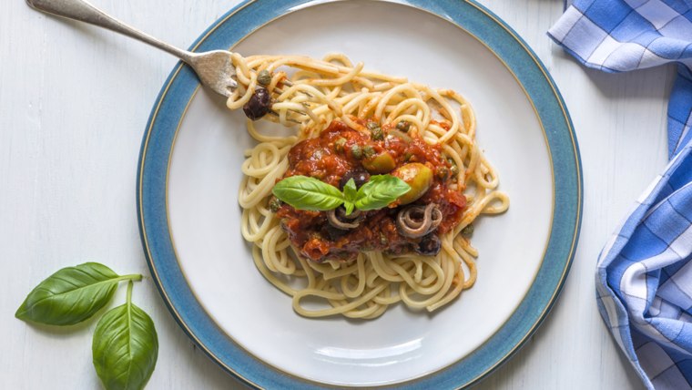 Spaghetti with traditional Italian puttanesca sauce