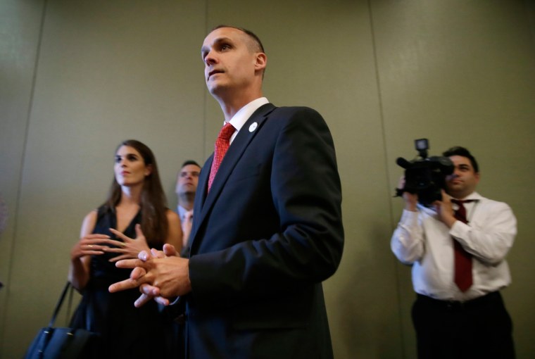 Image: Campaign manager Corey Lewandowski looks on as Republican presidential candidate Donald Trump speaks