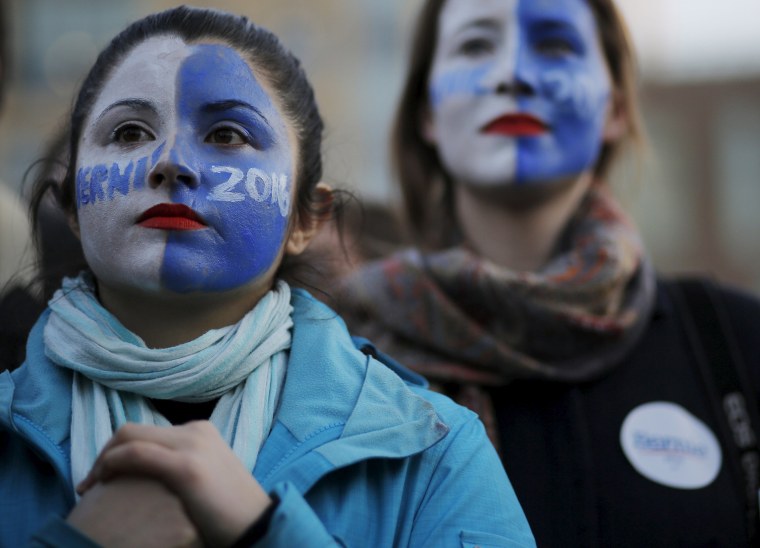 Image: Natalia Plaza and Suzanne Tufan, with their faces painted, wait for a campaign rally with U.S. Democratic presidential candidate and U.S. Senator Bernie Sanders in Washington Square Park in the Greenwich Village neighborhood of New York
