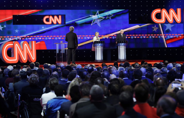Image: Hillary Clinton and Bernie Sanders debate in Brooklyn