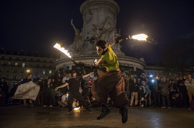 Image: Demonstrators protest against the labor law reform bill in Paris