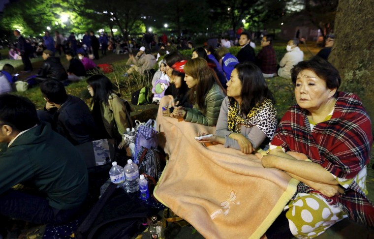 Image: Evacuated residents gather at Shirakawa park after an earthquake in Kumamoto, southern Japan