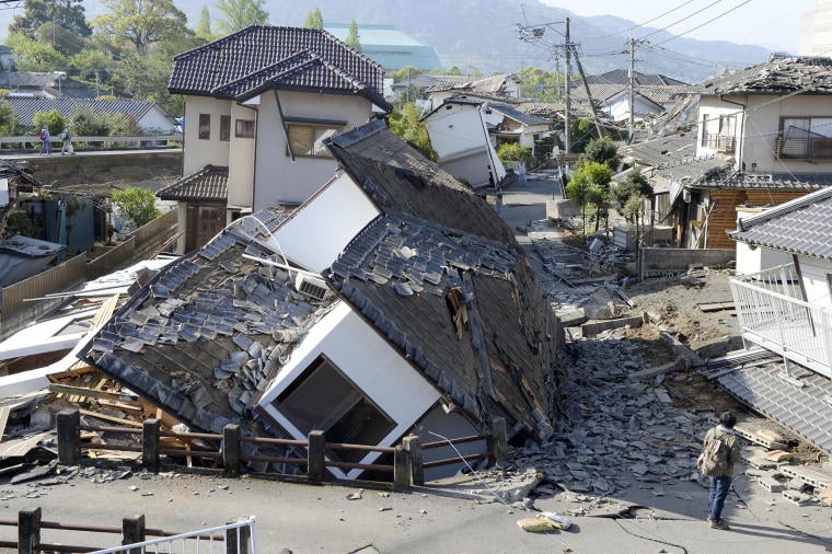 Image: Houses are seen destroyed after an earthquake in Mashiki