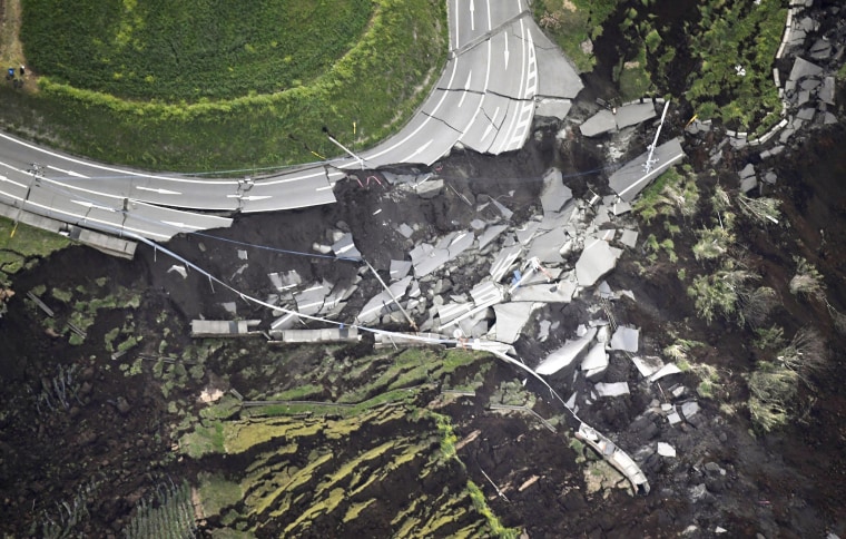 Image: A landslide caused by the earthquake destroys a road in Minamiaso