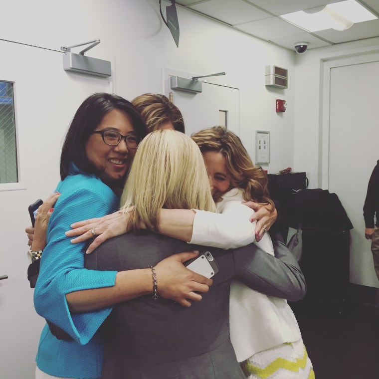 Tuesday's inventors hug it out after their segment.