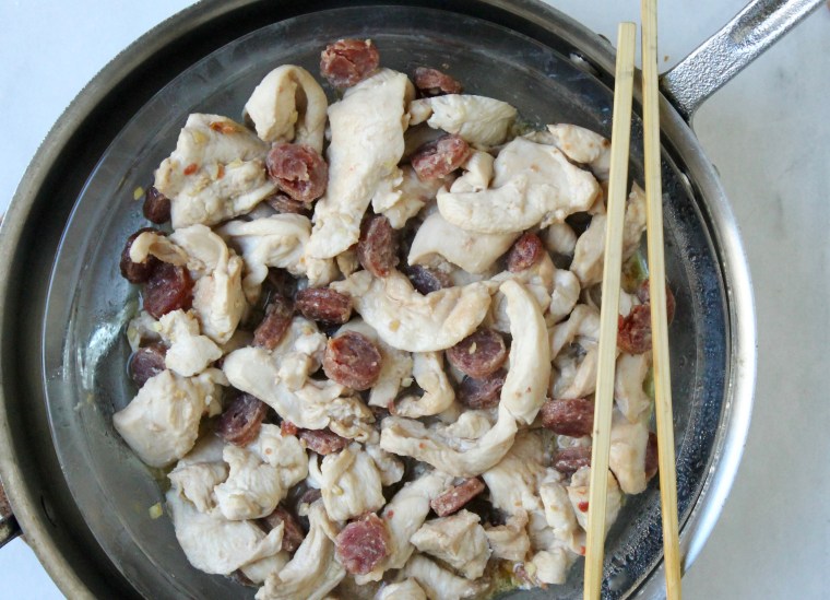 15-Minute Chinese Chicken and Sausages with Snow Peas: Steam the chicken and sausage mixture