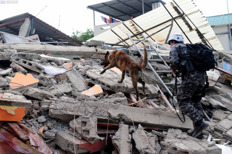 Image: Rescue workers in the city of Manta, Ecuador