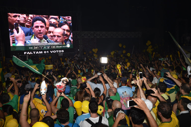 Image: Supporters of the impeachment of President Dilma Rousseff follow proceedings as lawmakers vote