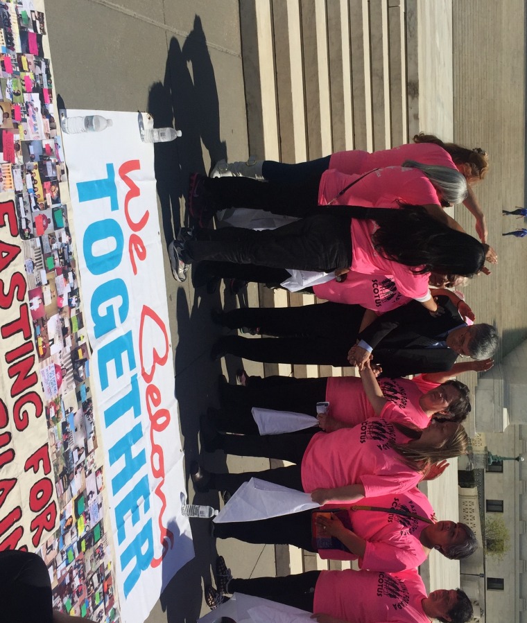 A group of women demonstrating on the U.S. Supreme Court steps.