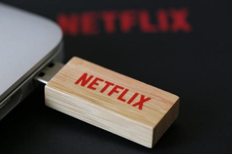 An USB key with the logo of Netflix the American provider of on-demand Internet streaming media is seen  in Paris
