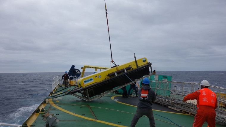 Image: The lost "towfish" device was winched to the surface Monday.