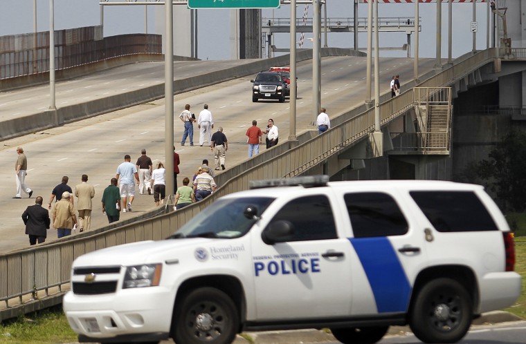 Police close parts of Interstate 10 and Chef Menteur Highway in New Orleans on July 26, 2011 so jurors could get a firsthand look at the spot where New Orleans police shot and killed two people and wounded four others less than a week after the 2005 storm.