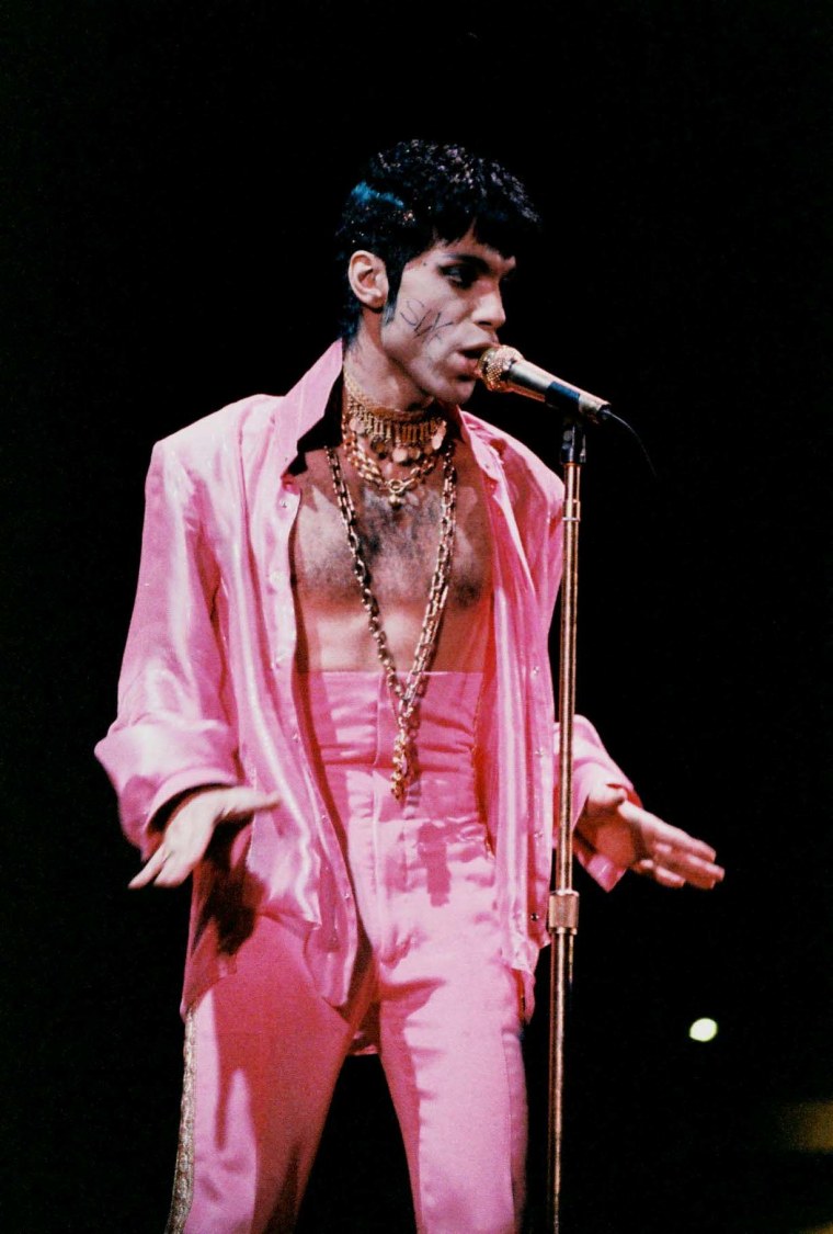 Prince performs on stage wearing 'Slave' tattoo, on 'The Ultimate Live Experience' tour at Wembley Arena on March 4th, 1995 in London, United Kingdom. (Photo by Peter Still/Redferns)