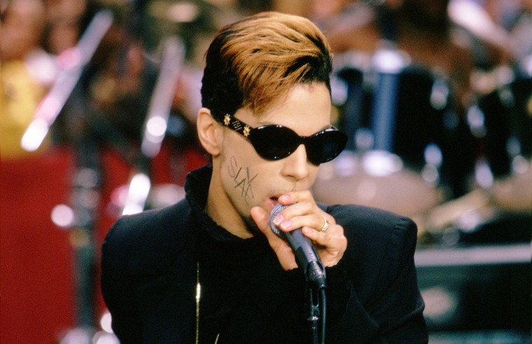 Image: Prince performs in 1996