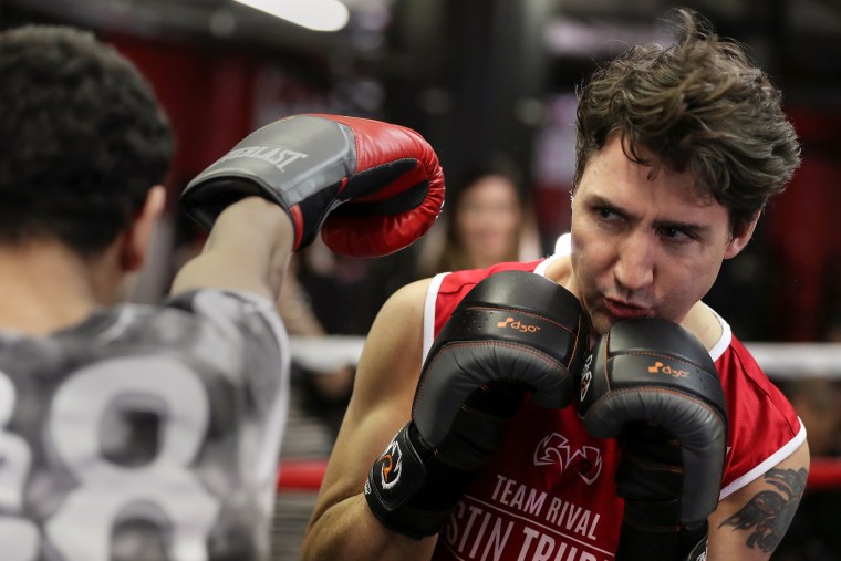 Image: Canadian Prime Minister Justin Trudeau dodges a punch as he spars in the ring at Gleason's Boxing Gym in the Brooklyn borough of New York