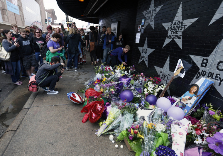 Image: Fans gather at a memorial at First Avenue Nightclub where the pop super star performed several times in his career