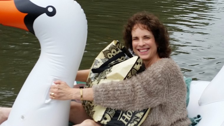 Midwife rides inflatable swan through Houston floods to deliver baby