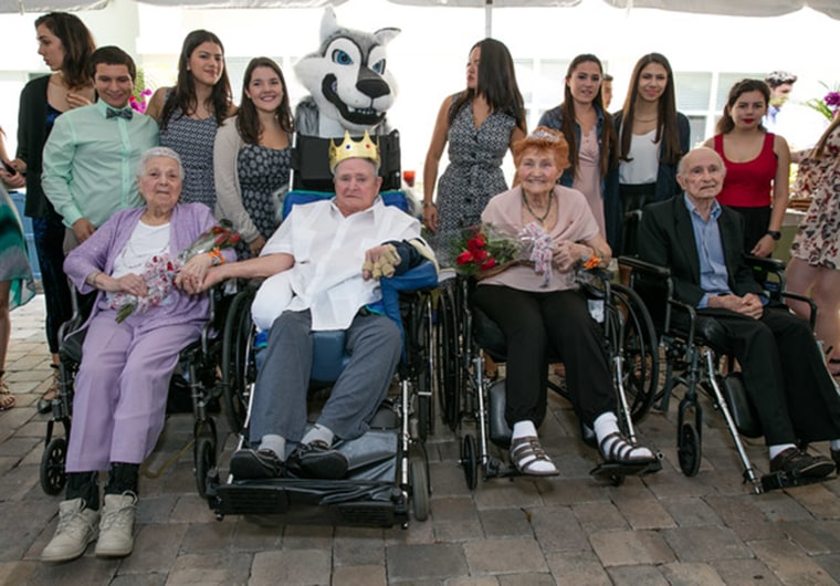Nursing home holds "Senior Prom" for the elderly.