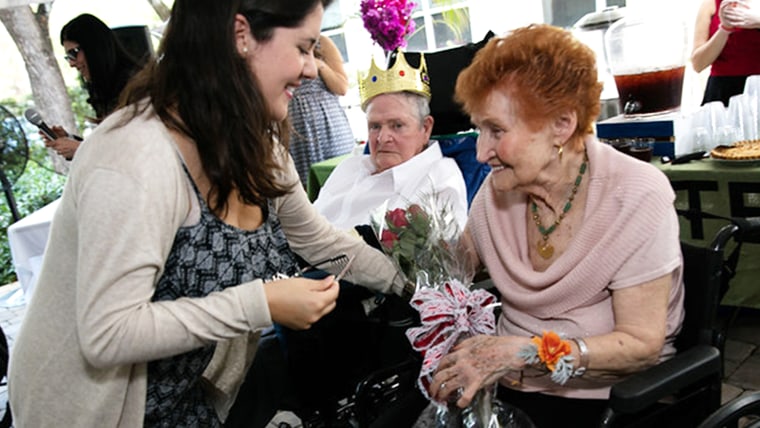 Nursing home holds "Senior Prom" for the elderly.