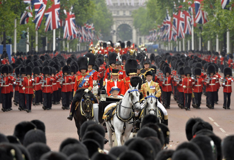Britain's Queen Elizabeth rides down The Mall in central London