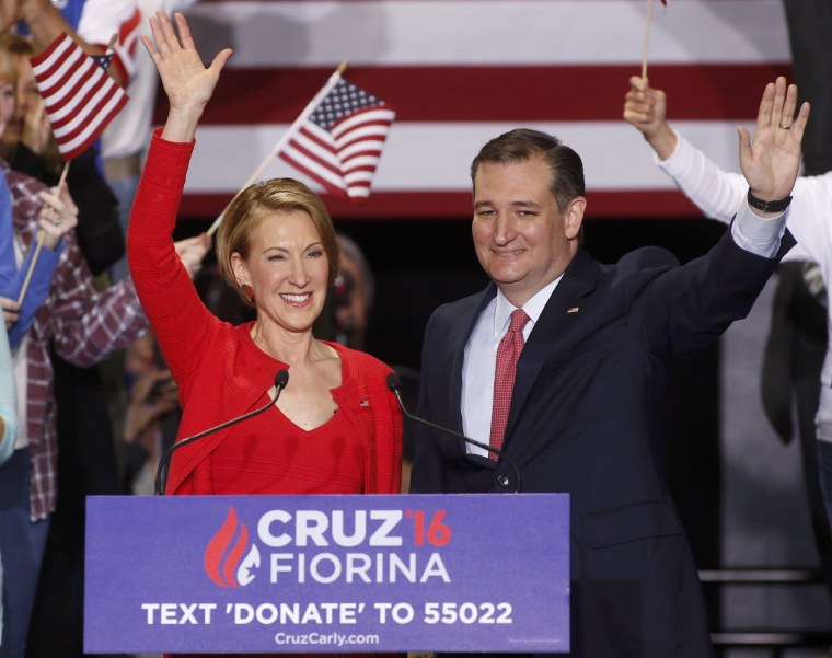 Image: Republican U.S. presidential candidate Cruz waves with Fiorina at campaign rally in Indianapolis