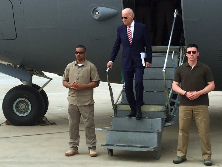 Vice President Joe Biden steps off a C-17 military transport plane upon his arrival in Baghdad, Iraq, on April 28.