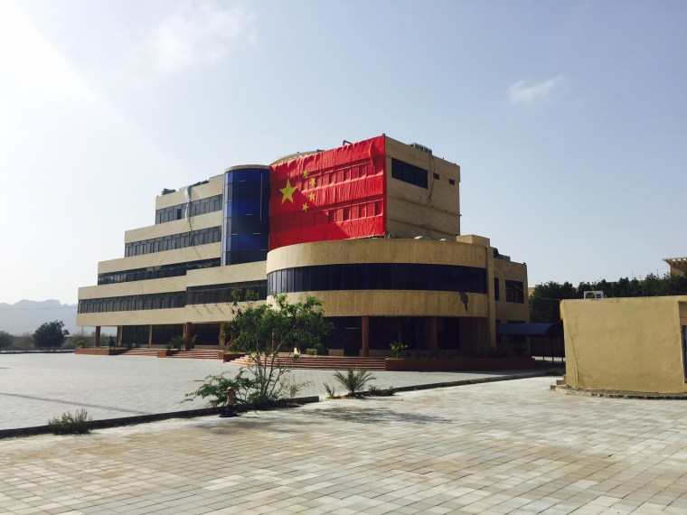 Image: A Chinese flag hangs on the Gwadar Port Authority building
