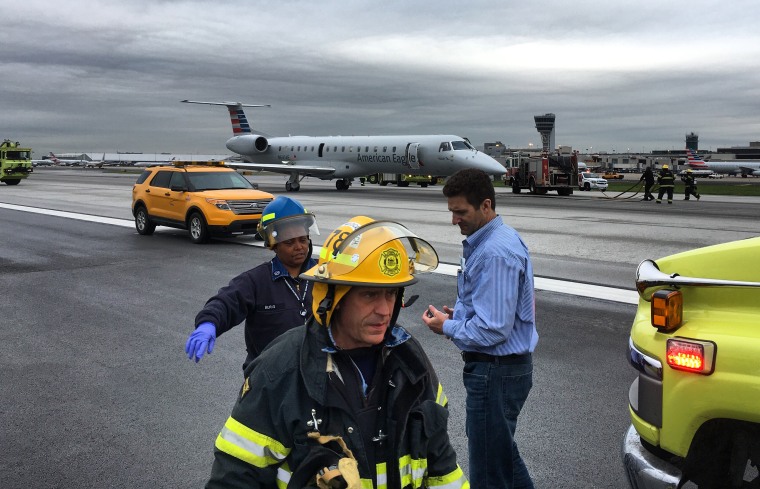 A passenger shot this photo after he was evacuated from an American Airlines plane.