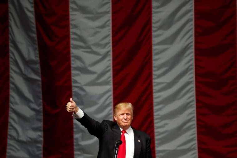 Image: Republican U.S. presidential candidate Donald Trump speaks at a campaign rally in Costa Mesa, California