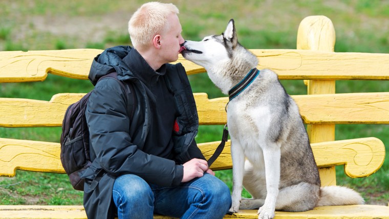 man with pet dog