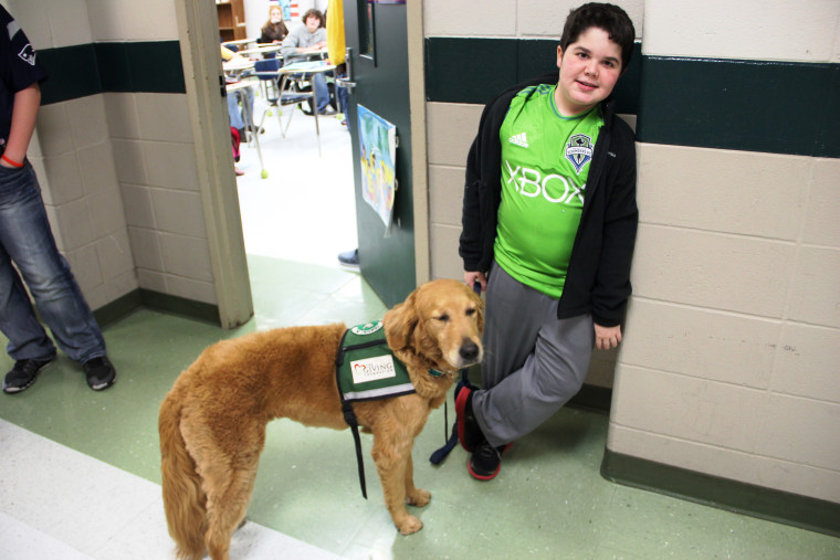 Seph Ware with his service dog, Presley