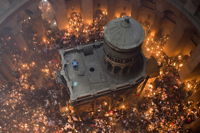 Image: Orthodox Christian worshippers gather for the "Holy Fire" ceremony