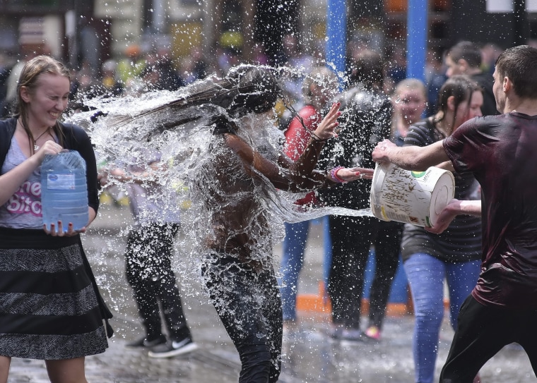 Image: Cleansing tradition by pouring water in Ukraine