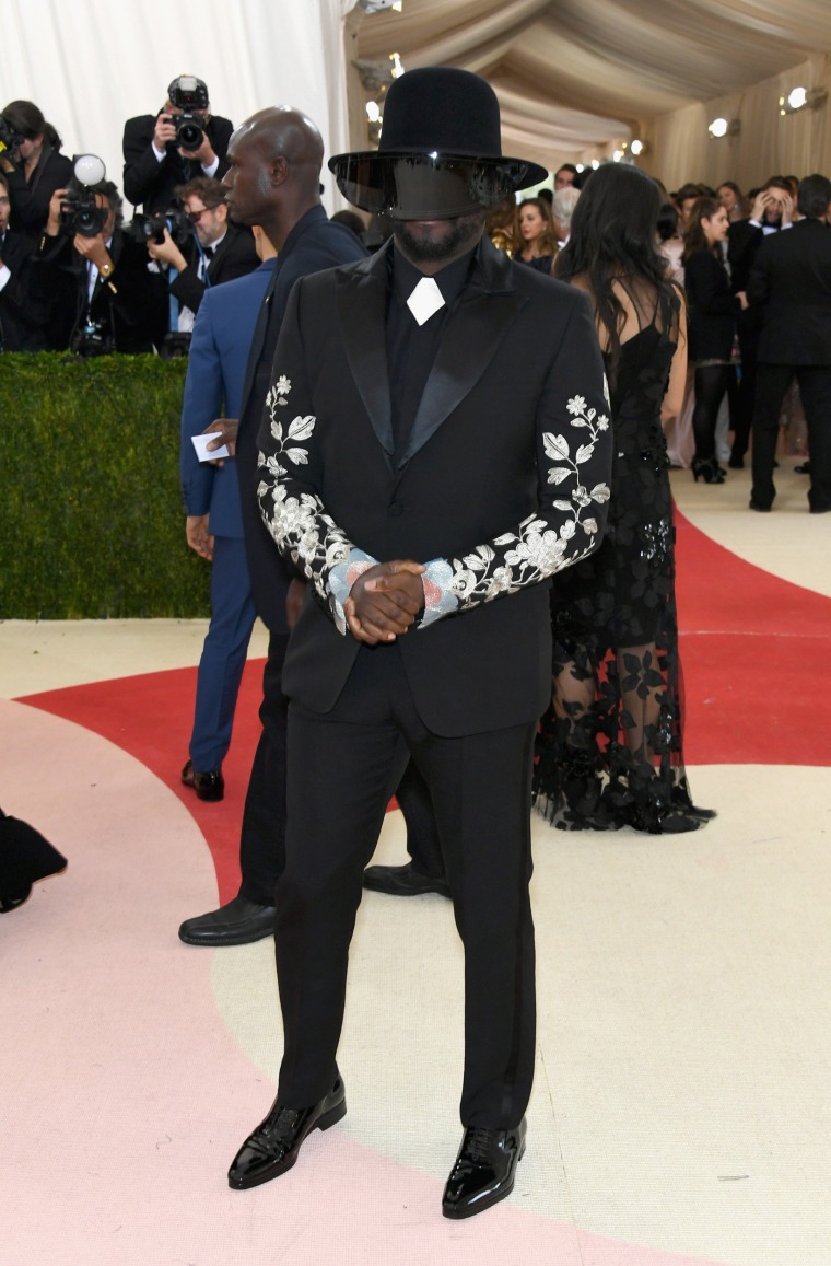 Image:  will.i.am attends the gala in a striking ensemble