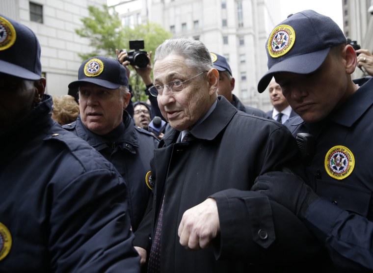 Image: Former Assembly Speaker Sheldon Silver leaves court surrounded by reporters