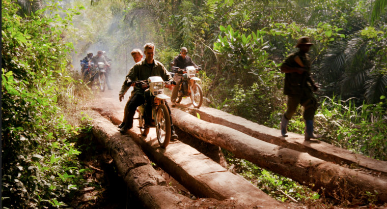 Richard Engel rides on the back of a motorcycle as he and the crew make their way to one of the most remote parts of the Congo.