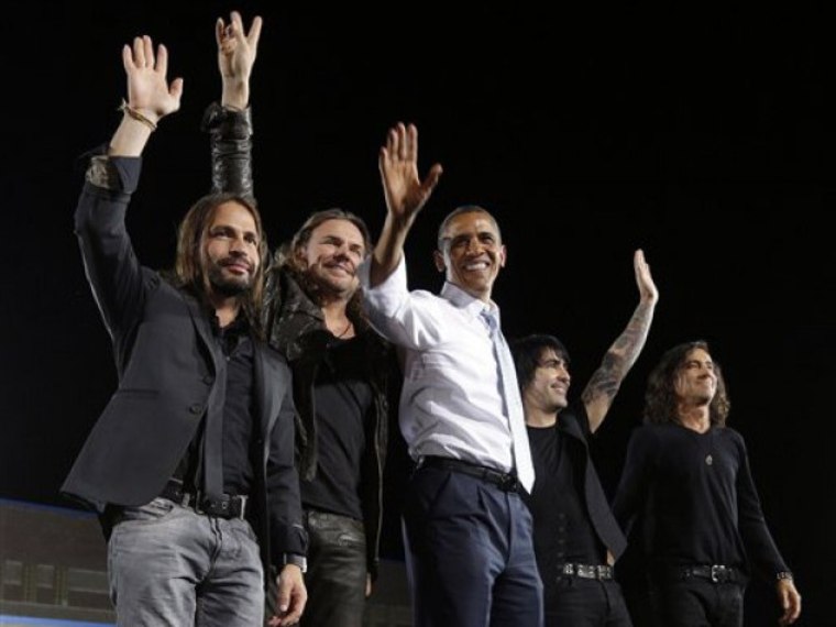 President Barack Obama and the Mexican rock group Maná in Nevada during a campaign rally for Obama in 2012.