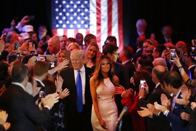 Image: Donald Trump and his wife Melania Trump arrive to speak to supporters at Trump Tower