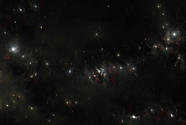 Image: Argentina's River Plate supporters cheer for their team during the Copa Libertadores 2016