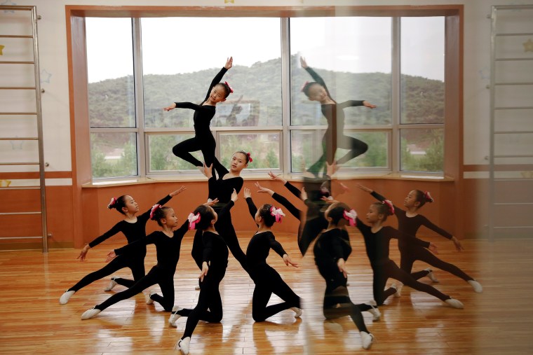 Image: Girls practice dancing at the Mangyongdae Children's Palace in central Pyongyang